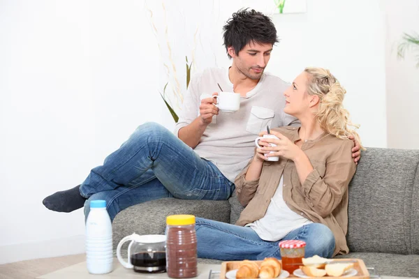 Couple with breakfast — Stock Photo, Image
