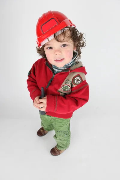 Small boy pretending to be foreman — Stock Photo, Image