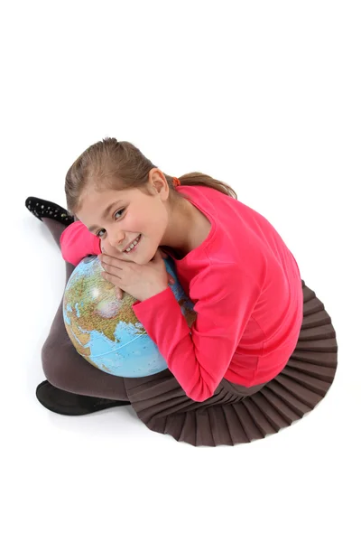 A kislány Globe — Stock Fotó