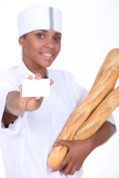 Bäckerin präsentiert ihren Einkaufswagen — Stockfoto