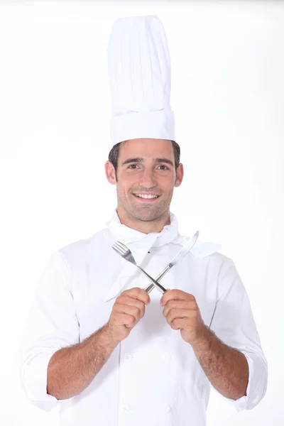 Chef with crossed cutlery — Stock Photo, Image