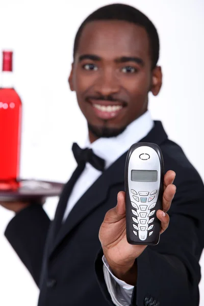 Servidor masculino con teléfono móvil —  Fotos de Stock