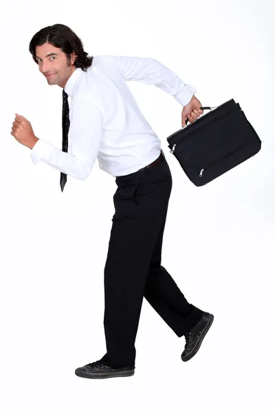 Businessman fleeing — Stock Photo, Image