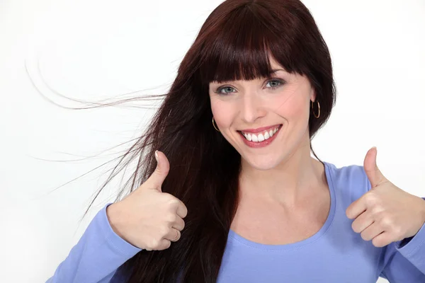 Woman giving the thumbs up — Stock Photo, Image
