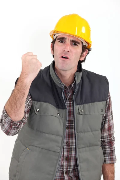 Construction worker raising his fist — Stock Photo, Image