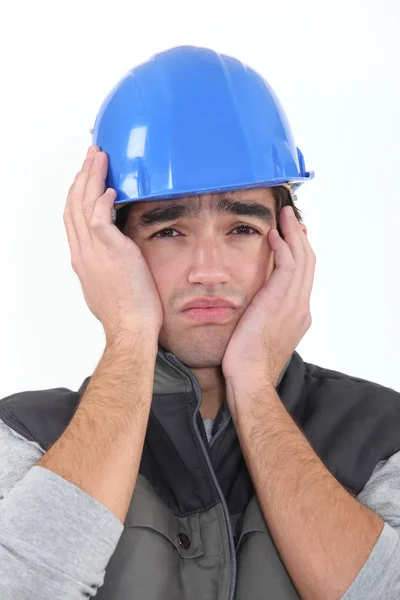 Ein depressiver Bauarbeiter. — Stockfoto