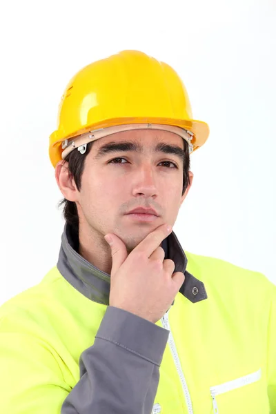 A pensive tradesman — Stock Photo, Image