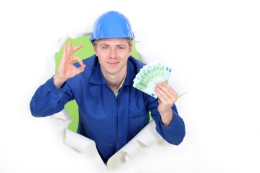 A hard-working tradesman earning an honest living clipart