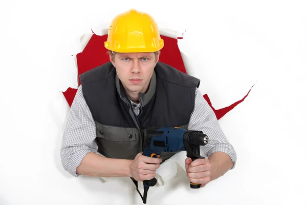 Worker wielding drill — Stock Photo, Image