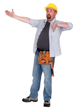 Tradesman pointing to an object and giving the thumb's down clipart