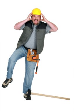 Craftsman hurting himself with a hammer clipart