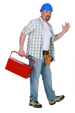 Tradesman going home for the day clipart