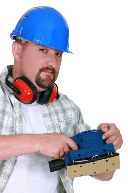 Mason demonstrating power sander clipart