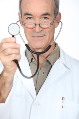 Doctor showing stethoscope clipart