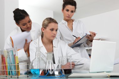 Researchers in the laboratory clipart