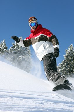 Snowboarder in action clipart