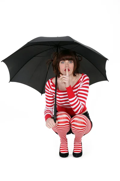 Kucki kobieta z czarny parasol — Zdjęcie stockowe