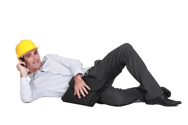 Confident engineer with a phone — Stock Photo, Image