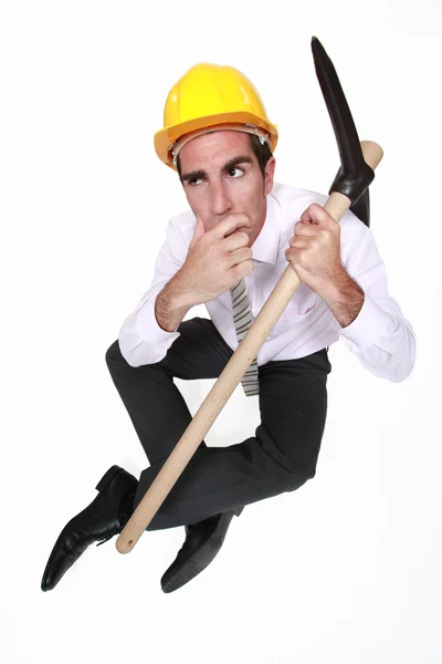 Entrepreneur with pickaxe — Stock Photo, Image