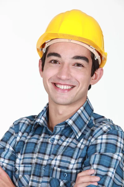 Arbetstagaren leende — Stockfoto