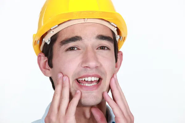 Diş ağrısı ile inşaat işçisi — Stok fotoğraf