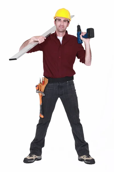 Worker with a cordless power drill — Stock Photo, Image