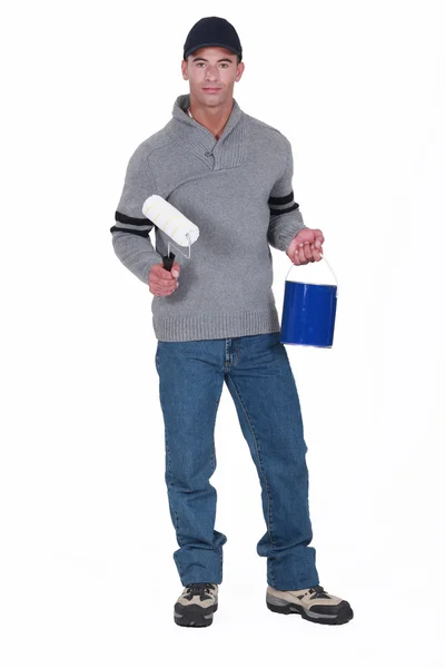 Decorator with paint pot and roller — Stock Photo, Image