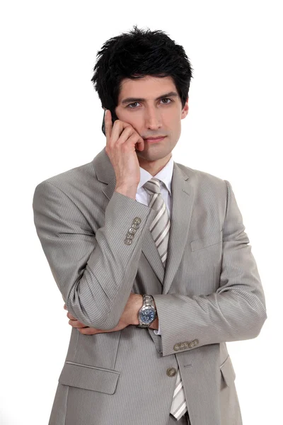 Hombre de negocios guapo en el teléfono —  Fotos de Stock