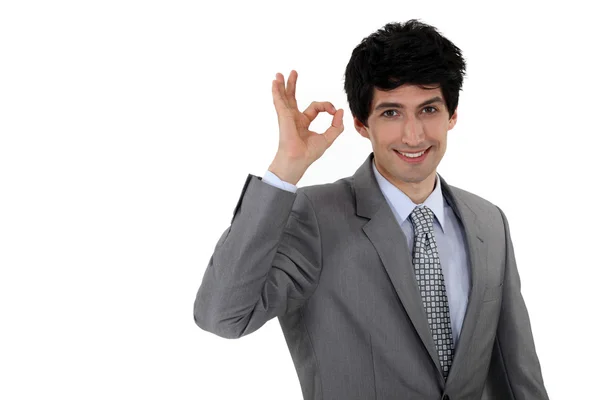 Businessman giving the a-ok sign — Stock Photo, Image