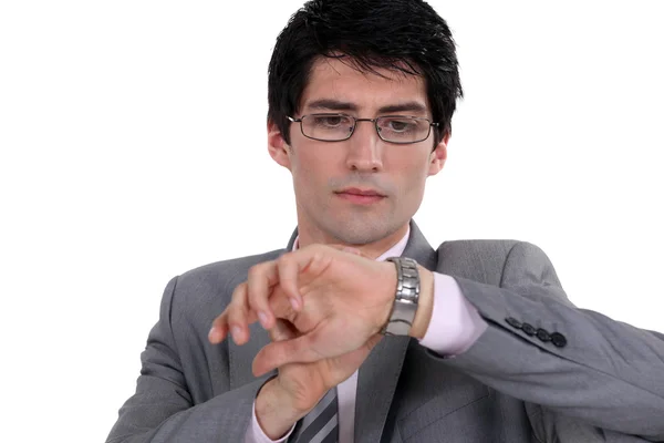 Businessman observing his watch — Stock Photo, Image