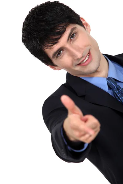 Homem com o dedo apontando para a frente — Fotografia de Stock