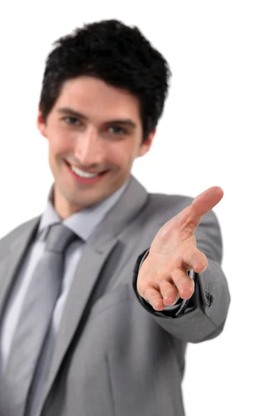 Дружній бізнесмен пропонує потиснути руки — стокове фото