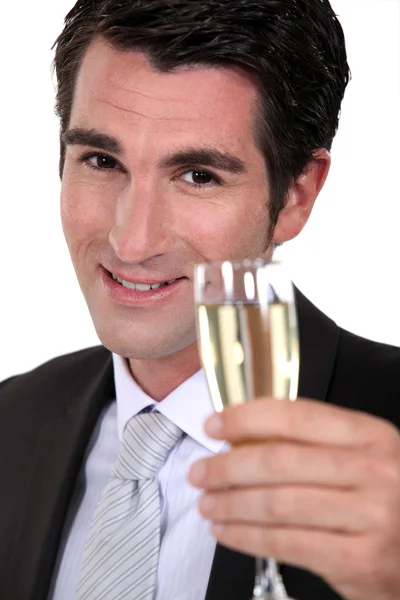 Uomo d'affari che beve champagne — Foto Stock