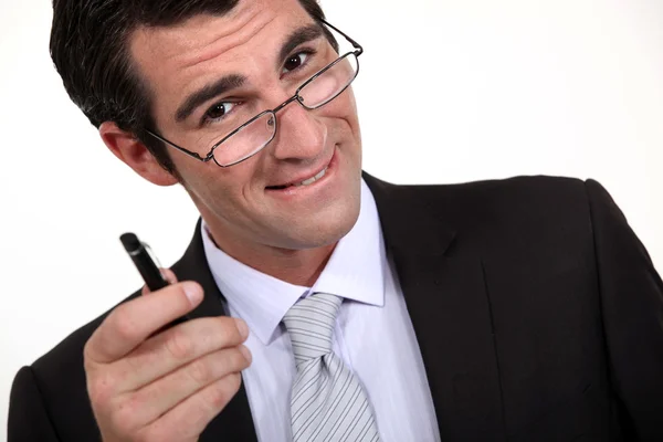 Businessman pointing his pen at you — Stock Photo, Image