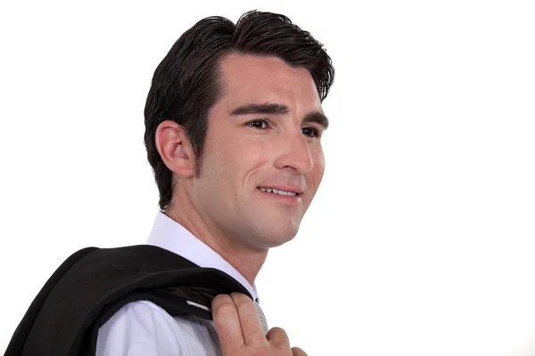 Бізнесмен з піджаком над плечем — стокове фото