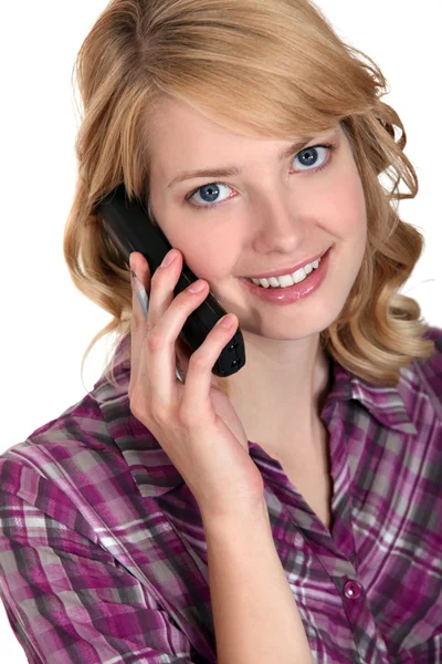 Attractive woman talking on the telephone — Stock Photo, Image