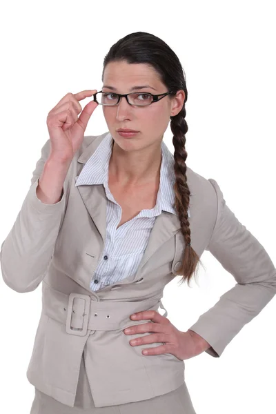 Patrón mujer de negocios tocando gafas —  Fotos de Stock