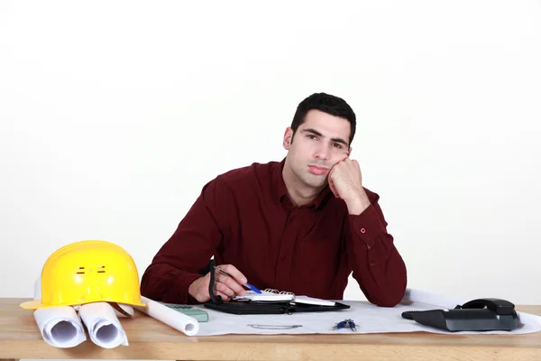 Lavoratore disinteressato in carica — Foto Stock