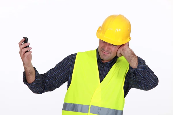 Construtor sofrendo de dor de cabeça — Fotografia de Stock
