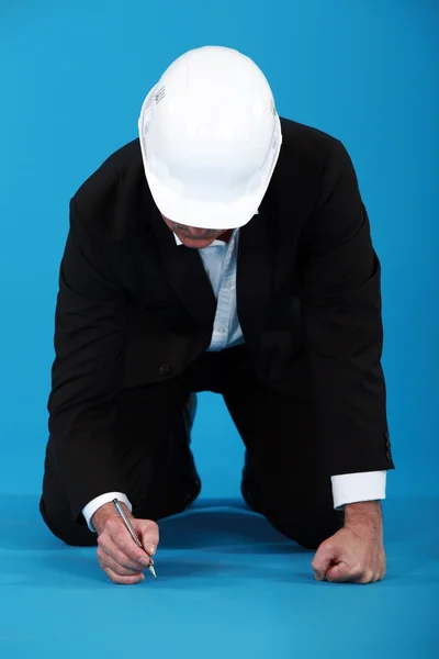 Architect drawing on the floor — Stock Photo, Image