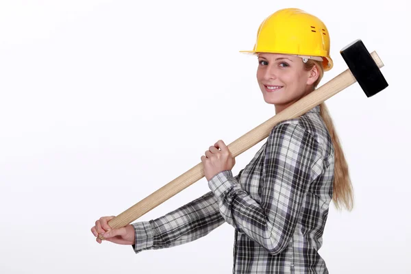 Tradeswoman carrying a mallet — Stock Photo, Image