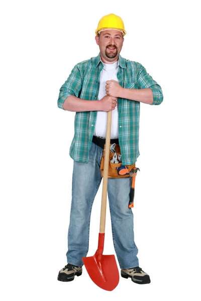 Artisan stood with shovel — Stock Photo, Image