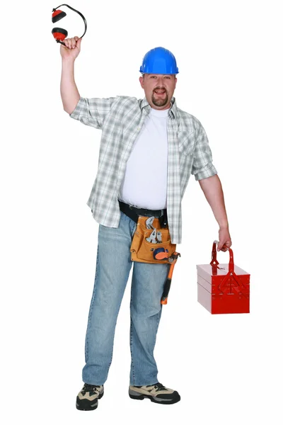 Mason com abas e caixa de ferramentas na mão — Fotografia de Stock