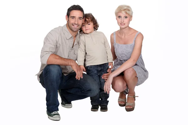 Studio shot of a young family — Stock Photo, Image