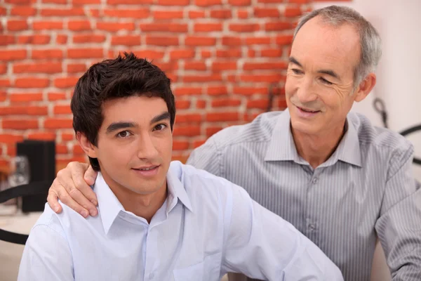 Man supporting his grandson — Stock Photo, Image