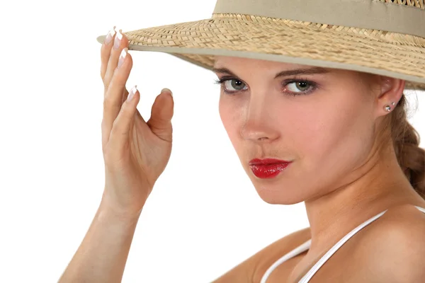 Egy nő széles karimájú kalapban. — Stock Fotó