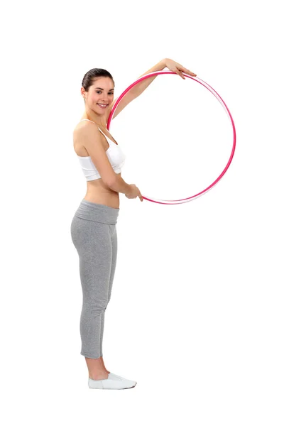 Donna che utilizza un hula hoop — Foto Stock