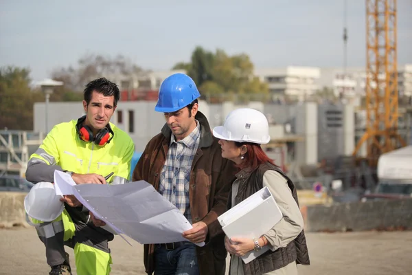 Team on construction site — Zdjęcie stockowe