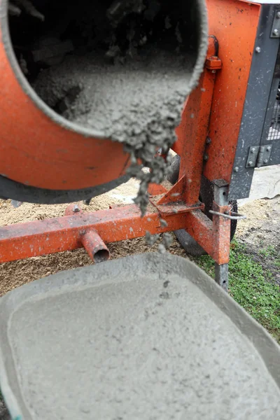 Wheelbarrow full of wet cement — Stock Photo, Image