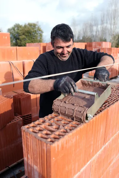 Portrait of a bricklayer — Stock Photo, Image